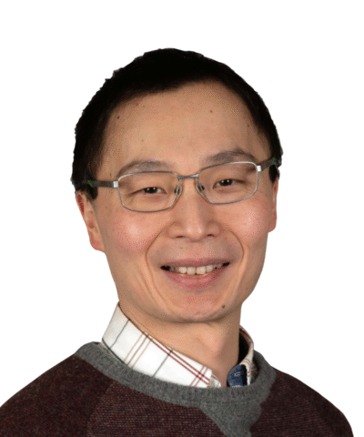Gang Xu, man smiling with a white background