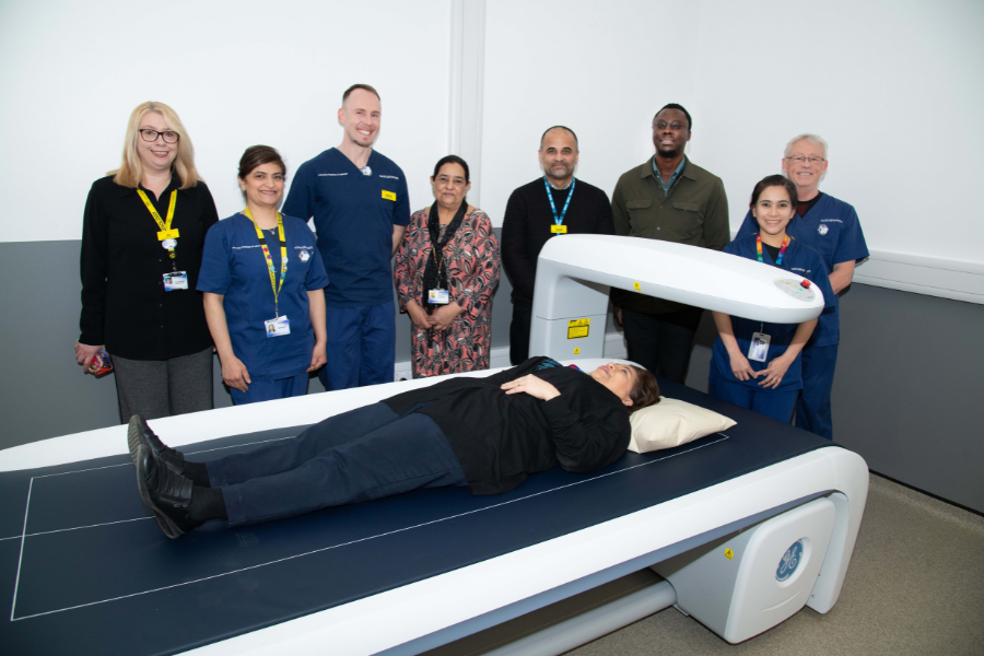 Colleagues with the DEXA scanner at the LGH